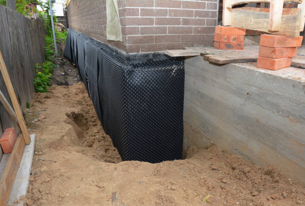 Happy homeowners after waterproofing job in Wyandanch